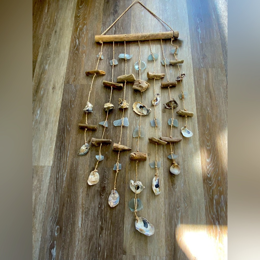 Driftwood, oyster shell, wind chime